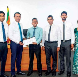 HNB Assurance signs MoU with State Mortgage and Investment Bank