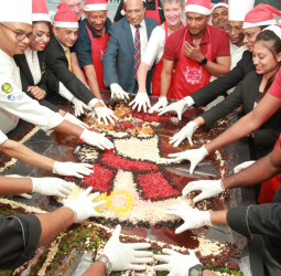 The Grand Kandyan Christmas cake mixing with the Cricket Stars